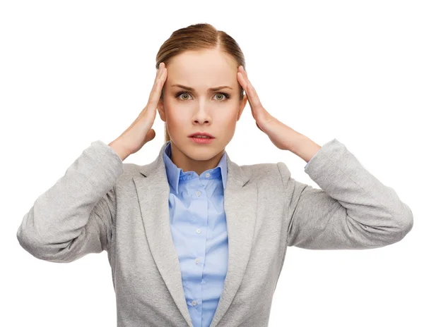 Stressad affärskvinna med huvudvärk — Stockfoto