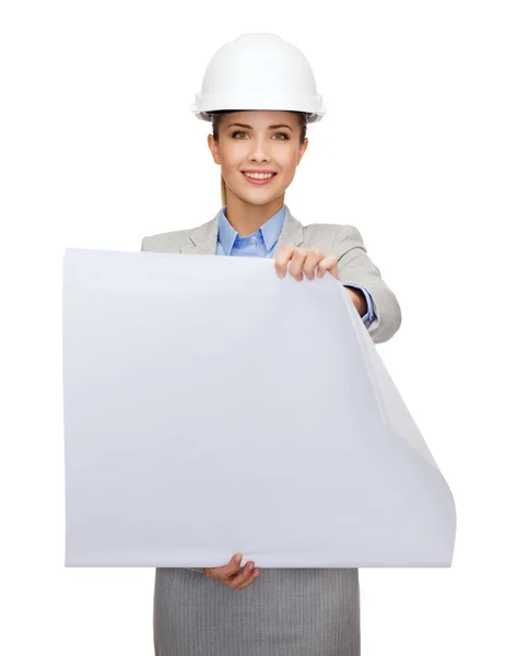 Smiling architect in white helmet with blueprints — Stock Photo, Image