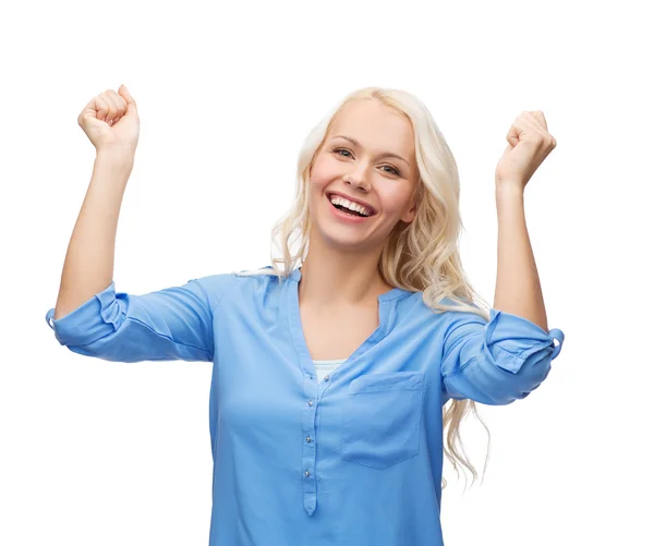 Mujer joven sonriente con las manos en alto — Foto de Stock