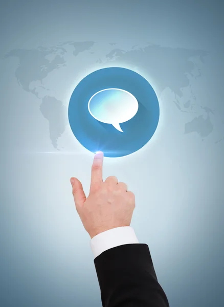 Close up of businessman pointing to text bubble — Stock Photo, Image