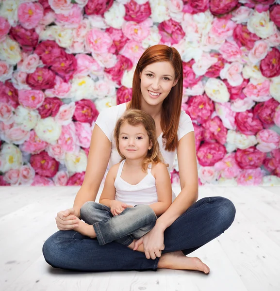 Happy mother with adorable little girl — Stock Photo, Image