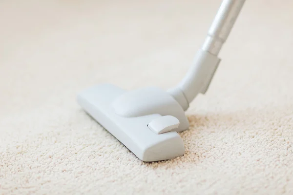 Close up of male hoovering carpet — Stock Photo, Image