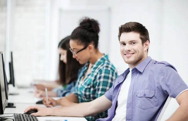 Student with computer studying at school — Stock Photo, Image