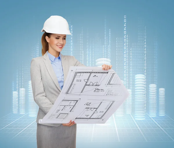 Smiling architect in white helmet with blueprints — Stock Photo, Image