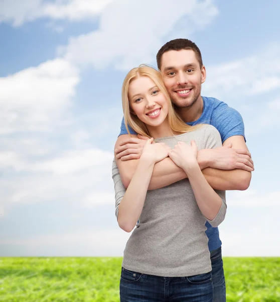 Smiling couple hugging Royalty Free Stock Photos