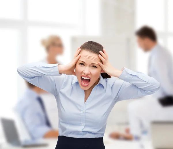 Angry screaming businesswoman — Stock Photo, Image