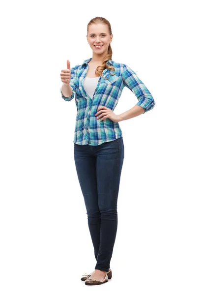 Young woman in casual clothes showing thumbs up — Stock Photo, Image