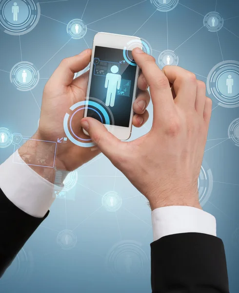 Businessman touching screen of smartphone — Stock Photo, Image