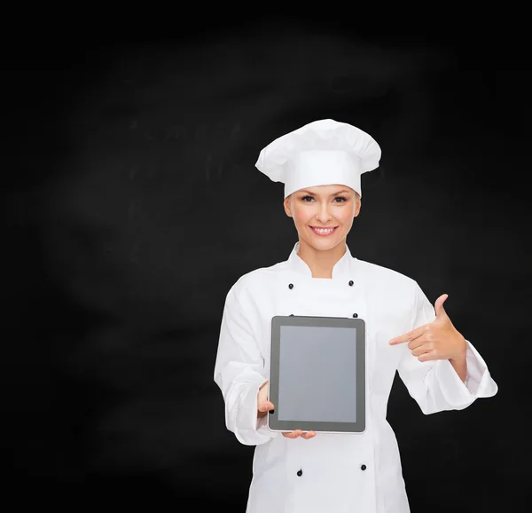 Smiling female chef with tablet pc blank screen — Stock Photo, Image
