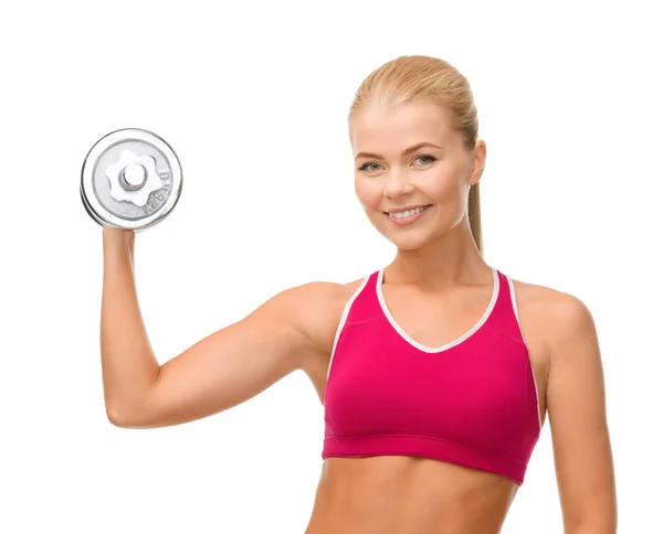 Smiling woman with heavy steel dumbbell — Stock Photo, Image