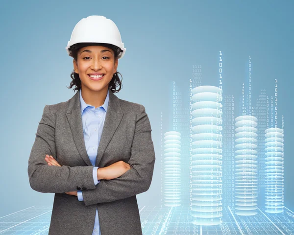 Businesswoman in white helmet with crossed arms — Stock Photo, Image