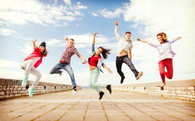Group of teenagers jumping clipart
