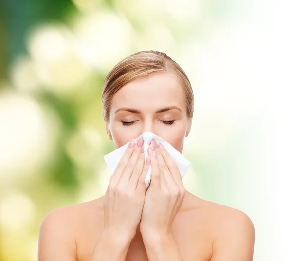 Beautiful woman with paper tissue — Stock Photo, Image