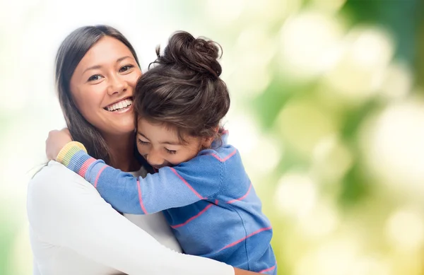 Hugging mother and daughter — Stock Photo, Image