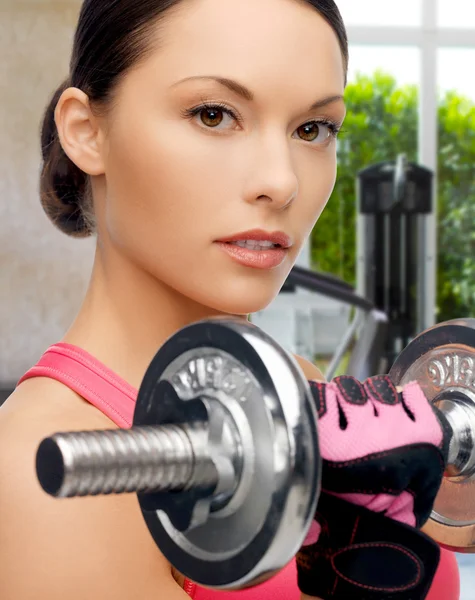Asian sporty woman with heavy dumbbell — Stock Photo, Image