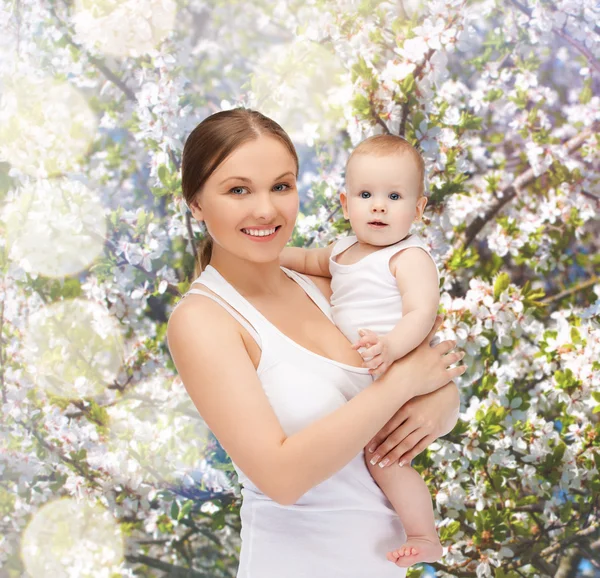 Happy mother with adorable baby — Stock Photo, Image