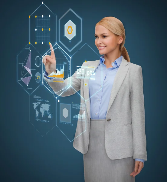 Smiling businesswoman working with virtual screen — Stock Photo, Image