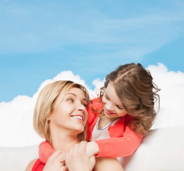 Hugging mother and daughter — Stock Photo, Image