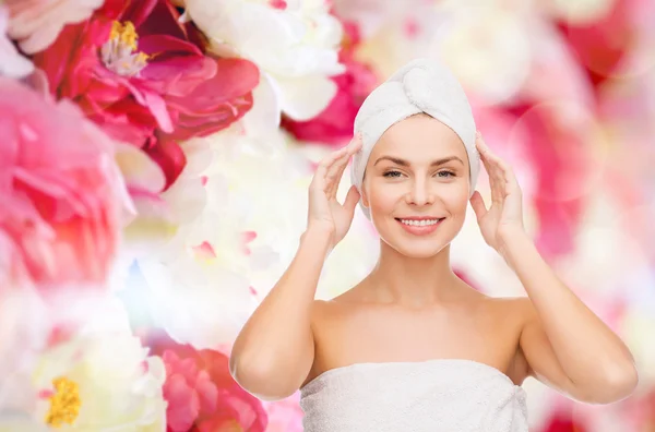 Beautiful woman in towel — Stock Photo, Image