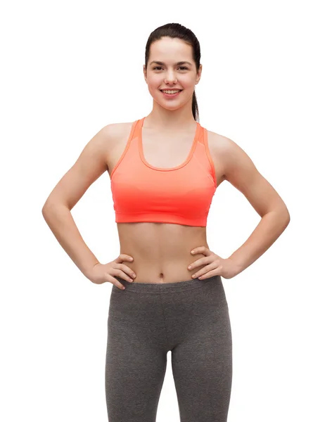 Smiling teenage girl in sportswear — Stock Photo, Image