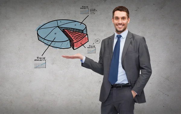 Man showing growing chart on the palm of his hand — Stock Photo, Image