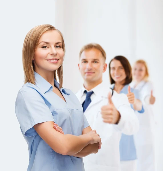 Smiling female doctor or nurse — Stock Photo, Image