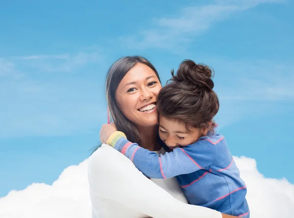 Hugging mother and daughter — Stock Photo, Image