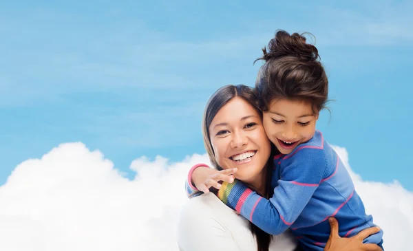 Hugging mother and daughter — Stock Photo, Image