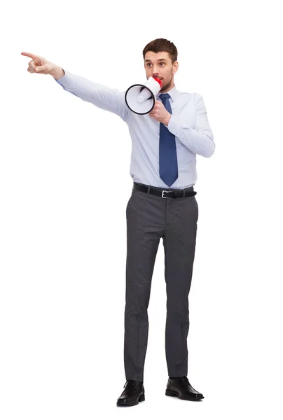 Angry businessman with megaphone — Stock Photo, Image