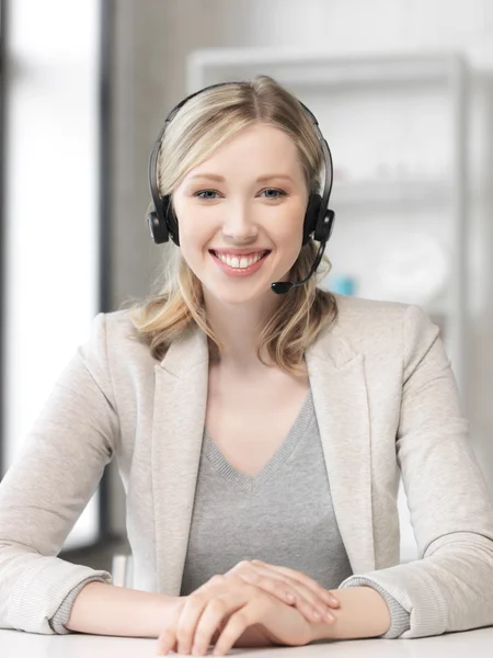 Friendly female helpline operator — Stock Photo, Image