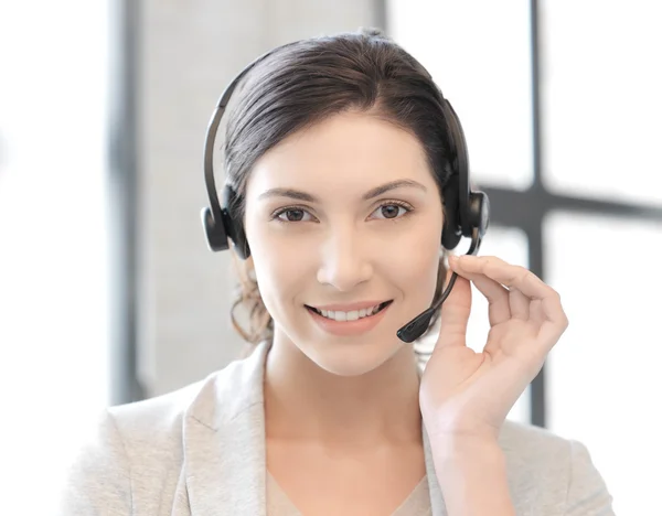 Friendly female helpline operator Royalty Free Stock Images