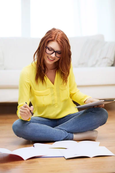 Student with tablet pc computer and notebooks — Stock Photo, Image
