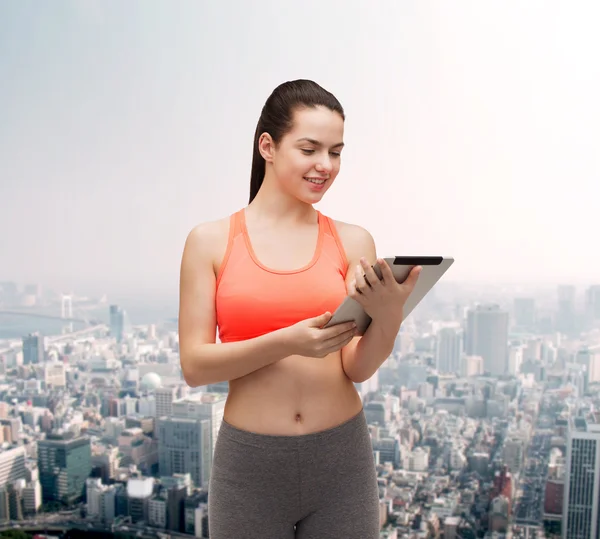 Mujer deportiva con tablet PC PC —  Fotos de Stock