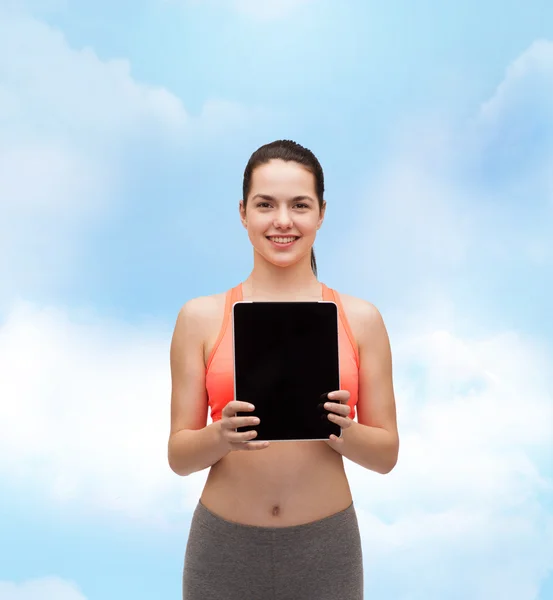 Sporty woman with tablet pc blank screen — Stock Photo, Image