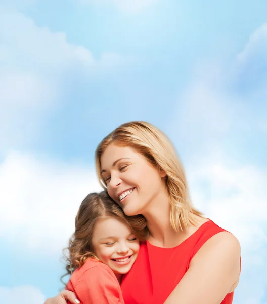 Hugging mother and daughter — Stock Photo, Image