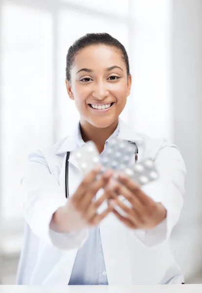 Doctor with blister packs of pills — Stock Photo, Image