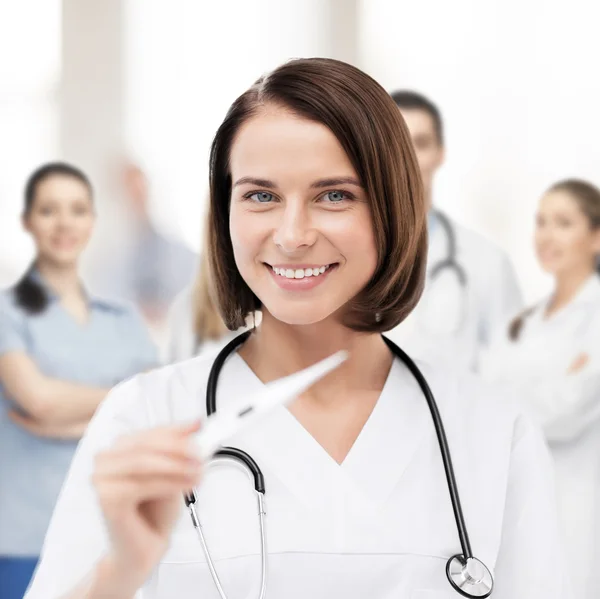 Doctor with thermometer and stethoscope — Stock Photo, Image