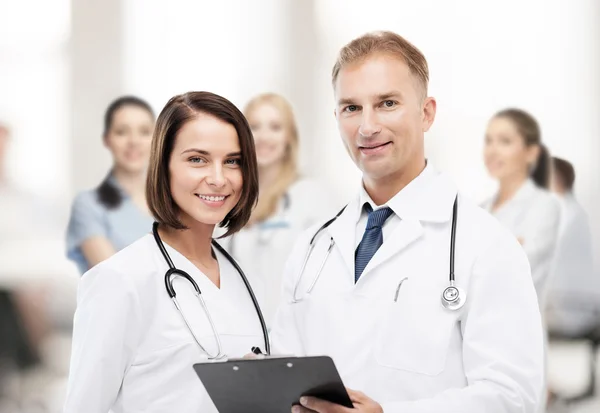 Two doctors with stethoscopes — Stock Photo, Image