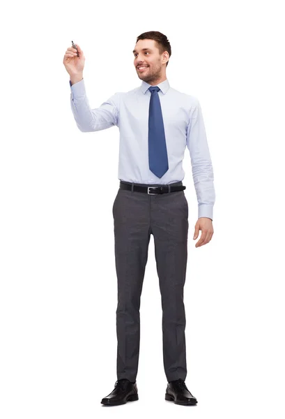 Attractive businessman or teacher with marker — Stock Photo, Image