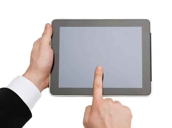Zamknij z rąk człowieka dotykania komputera typu tablet — Zdjęcie stockowe