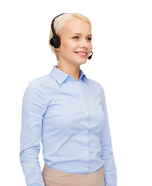 Amigável operador de linha de apoio feminino com fones de ouvido — Fotografia de Stock