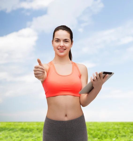 Mulher desportiva com computador tablet pc — Fotografia de Stock