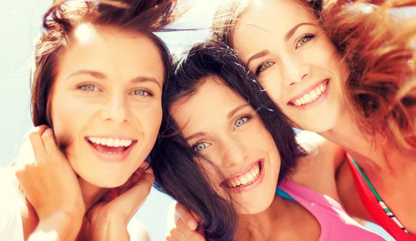 Girls faces with shades looking down — Stock Photo, Image