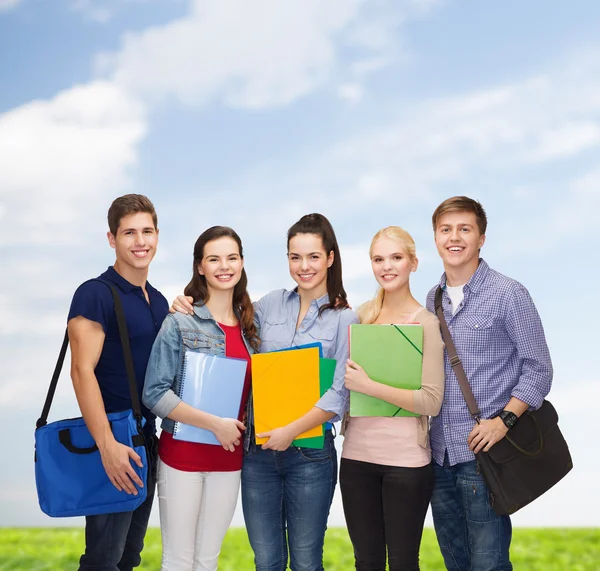 Group of smiling students standing Royalty Free Stock Images