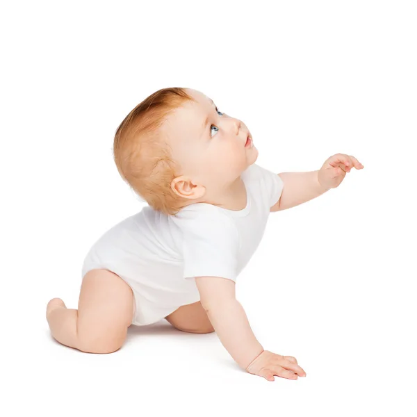 Rastejando bebê curioso olhando para cima — Fotografia de Stock