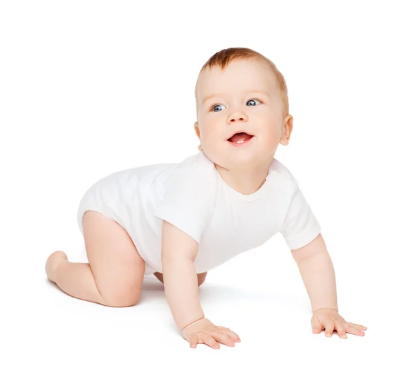 Gatear sonriente bebé mirando hacia arriba —  Fotos de Stock