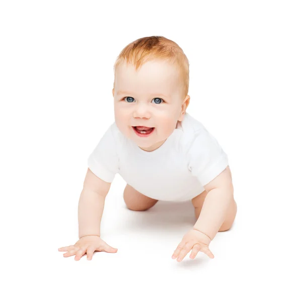 Crawling smiling baby looking up Royalty Free Stock Images