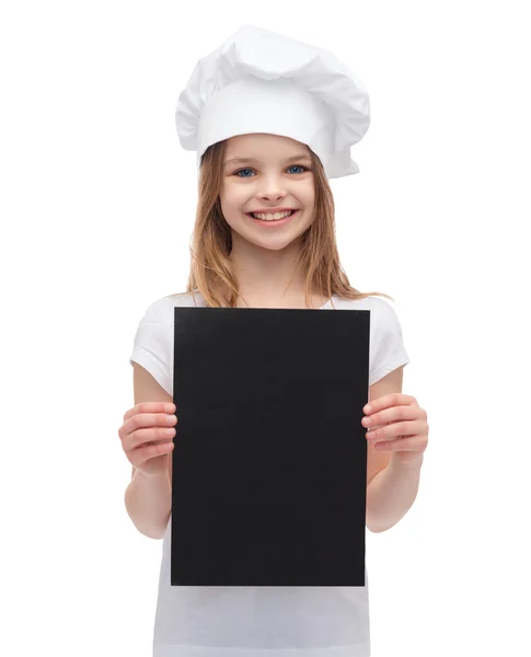 Pequeño cocinero o panadero con papel negro en blanco —  Fotos de Stock