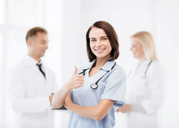 Team of doctors showing thumbs up — Stock Photo, Image