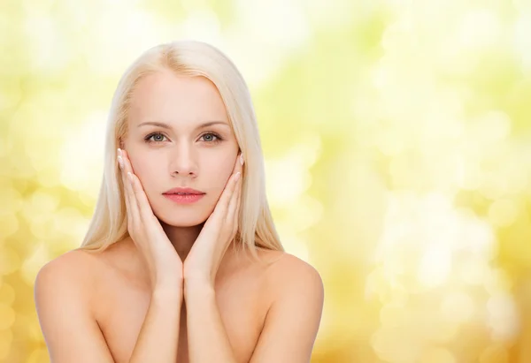 Face of beautiful woman touching her face skin — Stock Photo, Image